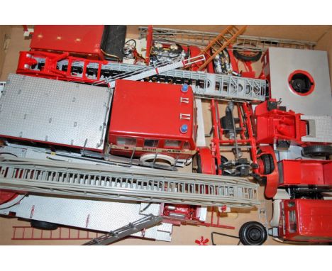 Three boxes of various plastic kit built and part built fire engine and fire service related kits