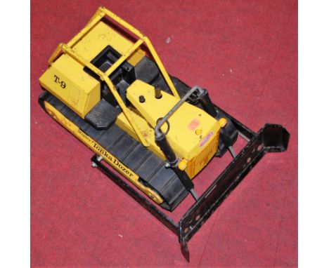 A Tonka Toys pressed steel model of a T9 Tonka Mighty Dozer