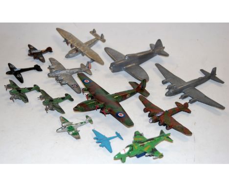 A box of assorted loose and playworn model aircraft to include Dinky toys etc