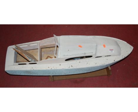 A late 20th century painted engine driven model of a cabin cruiser (incomplete)