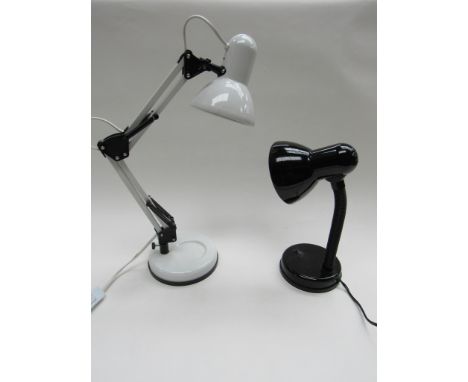 A white angle poised desk lamp together with a smaller black desk light.