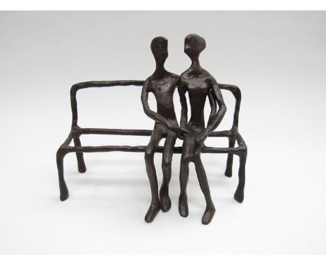 A contemporary bronzed Giacometti style couple on a bench.  Unmarked 16cm high 