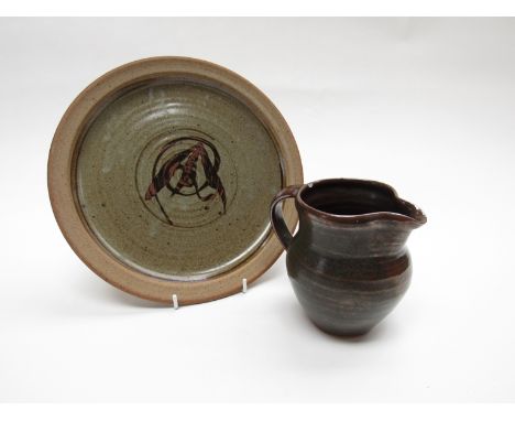 A David Leach iron oxide and green glazed jug (two chips to rim) with his personal seal and a Lowerdown pottery stoneware pla