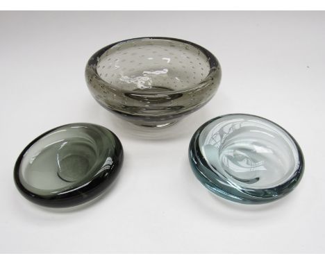 Two Per Lutken Holmegaard off set scoop dishes in blue and smoked glass and a Whitefriars smoked glass bowl with bubble inclu