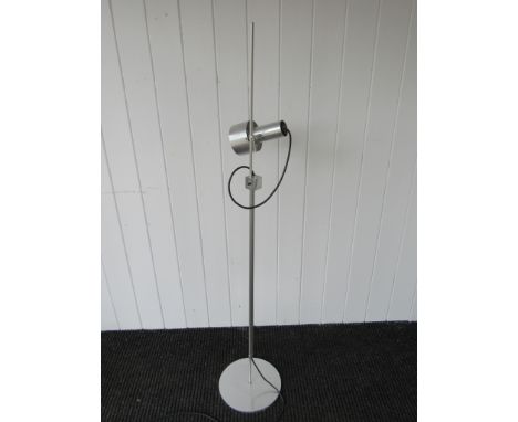 A Peter Nelson Architectural Lighting Co. aluminium standard lamp with single adjustable spot.
