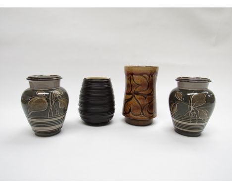 A Poole Pottery free form vase with ribbed body, treacle glaze, a Poole Aegean vase and a pair of Denby Fresco vases. Tallest