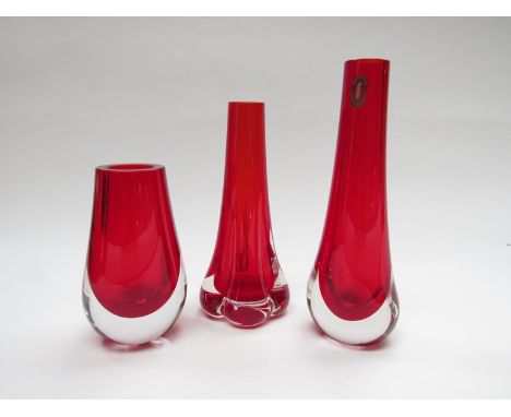 Three Whitefriars ruby bud vases, tallest 25.5cm
