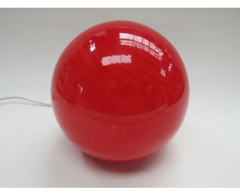 A red glass ball table lamp 