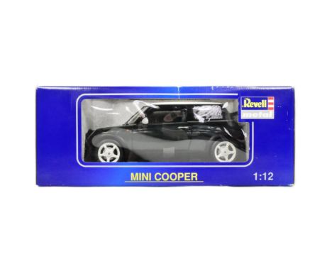 Diecast - a boxed Revell made 1/12 scale diecast model 08452 Mini Cooper. Model appears mint and unused.