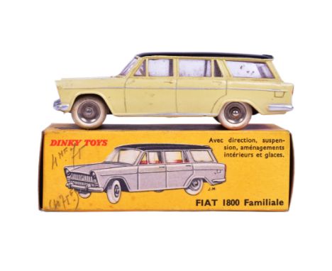 French Dinky Toys - an original vintage French made Dinky Toys boxed diecast model No. 548 Fiat 1800 Familiale. Cream body wi