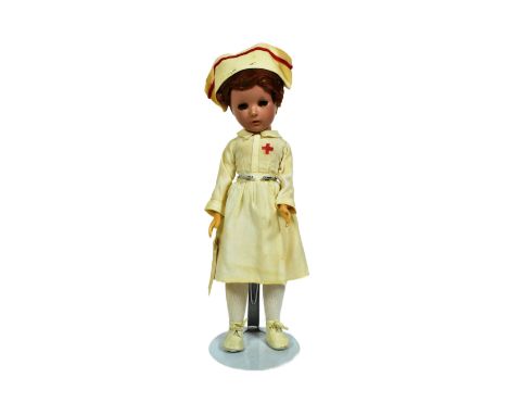 Doll - a c1930s American made 'Madam Alexander' Wendy-Ann 'Nurse' doll. Composition head and body, with flirty eyes, and full