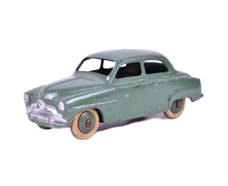 French Dinky Toys - an original vintage French made Dinky Toys diecast model No. 24U Simca 9 Aronde. Green with cream wheels.