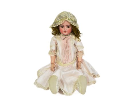 Dolls - a LARGE early 20th Century German Heinrich Handwerck Simon &amp; Halbig bisque headed doll. Brown flirty eyes, finely