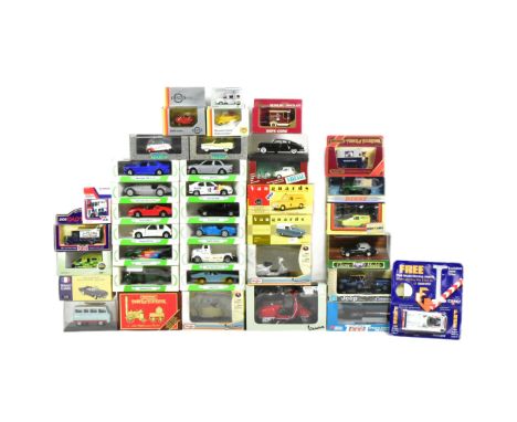 Diecast - a collection of assorted boxed diecast model cars to include; Lledo Vanguards, Matchbox Dinky, Atlas Editions, Gama