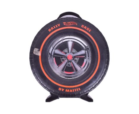 Diecast - an original vintage Mattel made Hot Wheels Redline diecast wheel shaped carry case along with x6 redline cars, each