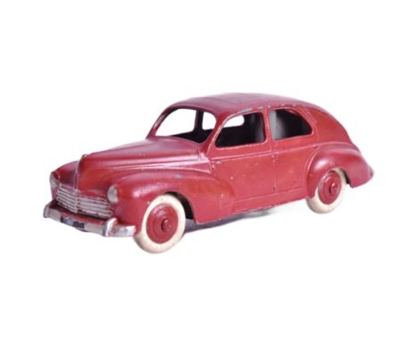 French Dinky Toys - an original vintage French made Dinky Toys model Peugeot 203. Brown with crea, wheels and black chassis. 