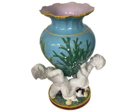 A Large Minton Majolica Vase or Lamp Base with sea nymphs entwined holding a vase decorated with sea wood, shell form top, th