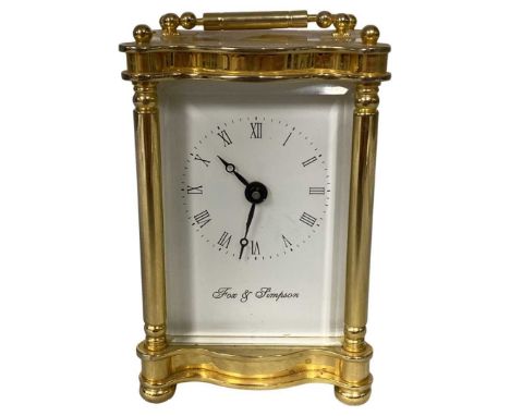 Fox and Simpson Brass Mounted Carriage Clock. With key and appears in full working order. Winds anti-clockwiseVery good