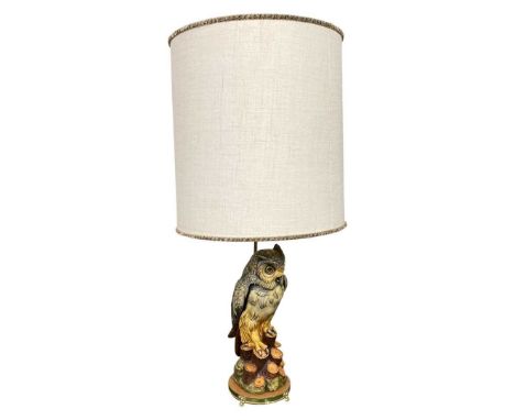 Large Owl Lamp. Owl stands on a tree stump raised on gilt metal stand. Appears unmarkedHeight to top of light fitting 65 cms