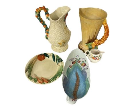 Clarice Cliff. 5 Assorted Pieces and Patterns to include a Celtic Harvest pattern jug, another jug, a leaf dish, a plate with