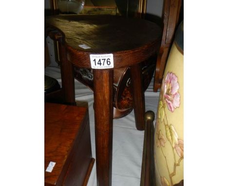 A stool featuring a figure of a mouse.