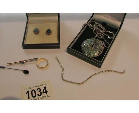 A 9ct gold band ring, hall marked B. Bros, 175, London, size M, 2 tie pins, a pair of earrings and an abalone and silver pend