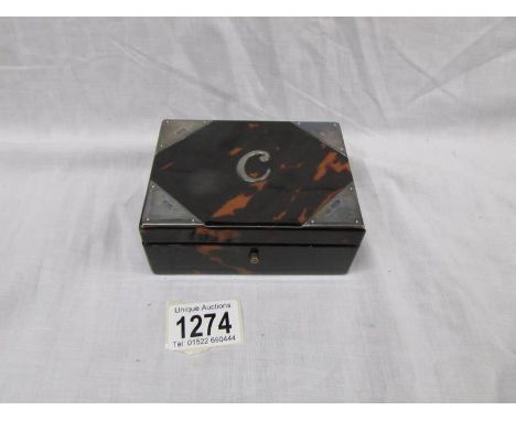 A faux tortoise shell trinket box with silver corners, a/f.