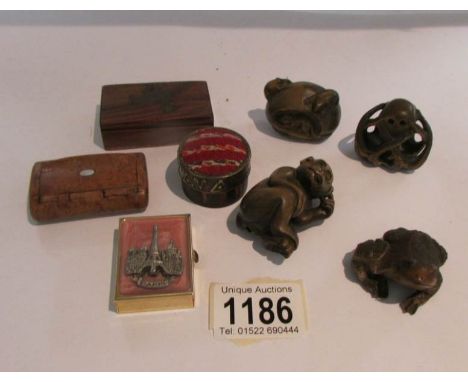 4 wooden netsuke and 4 snuff boxes.