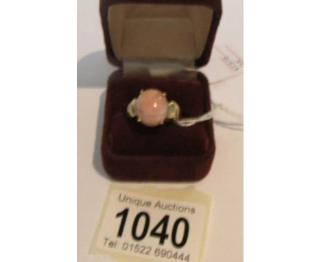 A pink stone set ring in 9ct gold, size S.