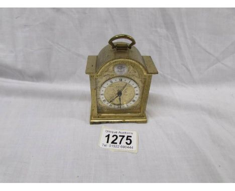 A small brass Swiza bracket clock with alarm.