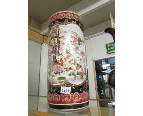 An oriental porcelain stick stand. ****Condition report**** Approximate height 45.5cmApproximate diameter 20.25