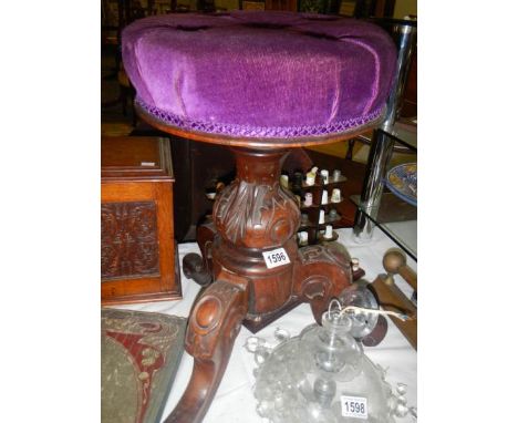 A Victorian piano stool.
