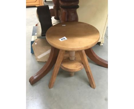 An adjustable stool