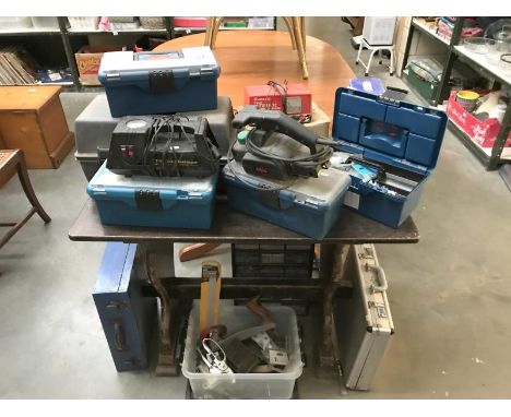 A large quantity of tool boxes and accessories