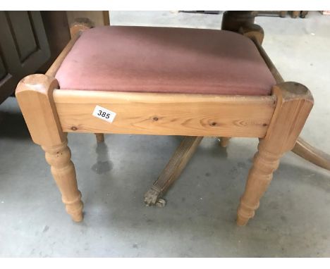 A pine bedroom stool