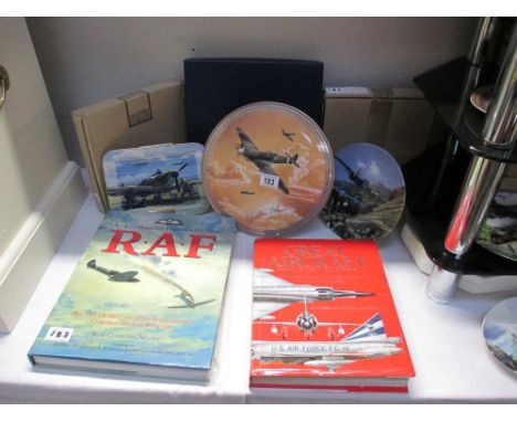 A boxed Royal Worcester Johhne Johnson plate and other RAF related plates and books
