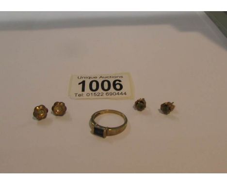 A 9ct gold ring set onyx, size N and 2 pairs of earrings (missing one back).