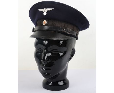 Third Reich Reichskriegerbund (War Veterans) Peaked Cap, good example of blue wool body peaked cap with black central woven b