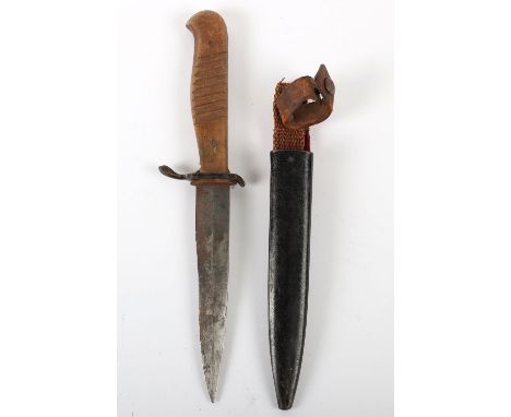 WW1 German Trench Knife, with two slab wooden grips secured by small pins. Blackened steel small cross guard and housed in th