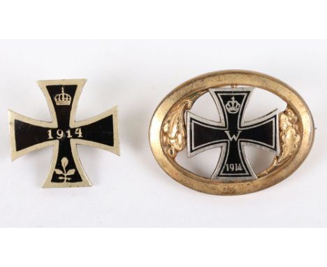 2x 1914 Iron Cross Brooch Pins, one being an oval gilded brooch with black enamel Iron Cross to the centre. Brooch pin fittin