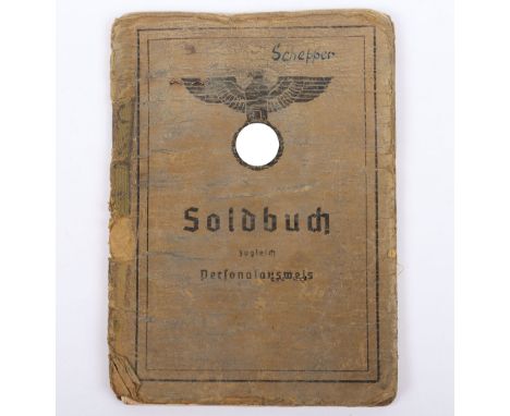 WW2 German Army Soldbuch, well used example of a German army Soldbuch with civilian photograph to the inside front cover. Boo