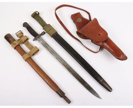 British P-1913 Bayonet by Remington, with two piece wooden grips, housed in leather and steel mounted scabbard. Attached to t