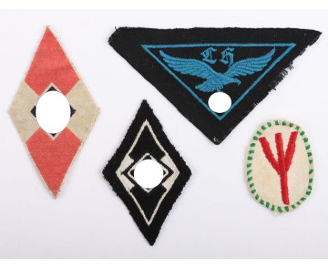 Grouping of Hitler Youth Insignia, including scarce embroidered white on black diamond for former members of the Hitler Youth