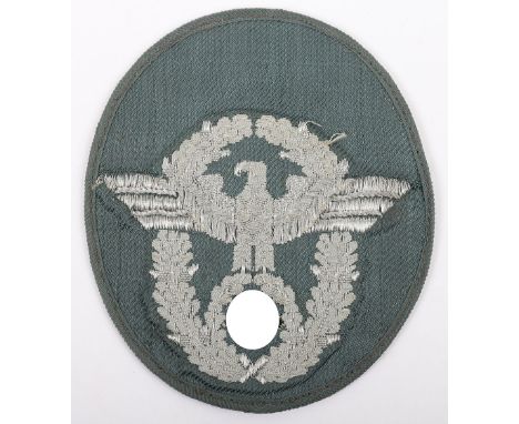 Scarce Variation WW2 German Police Officers Tunic Arm Eagle, being an unusual flat wire example which has been mounted onto a