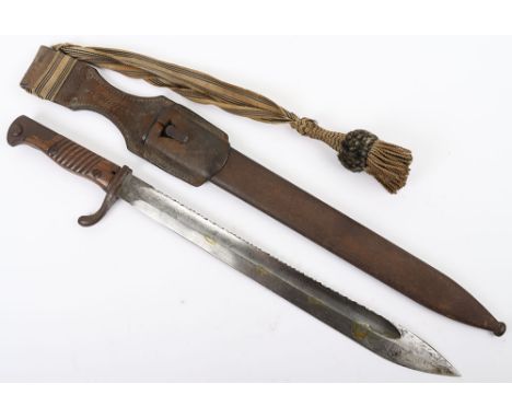 WW1 German Model 98/05 Sawback Mauser Bayonet, good example with two piece wooden grips, steel pommel and cross guard. Housed