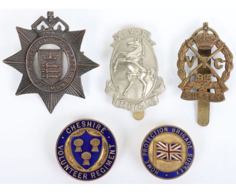 Grouping of WW1 VTC Badges, including bronzed Middlesex Volunteers cap badge, brass VTC Surrey cap badge with slider fitting,
