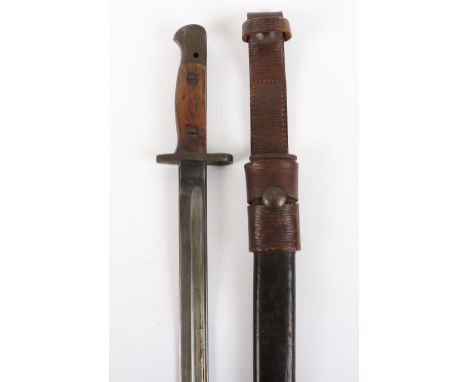 British 1907 Pattern Bayonet by Wilkinson, with two piece wooden grip with securing screws. Steel pommel with oil hole and cr