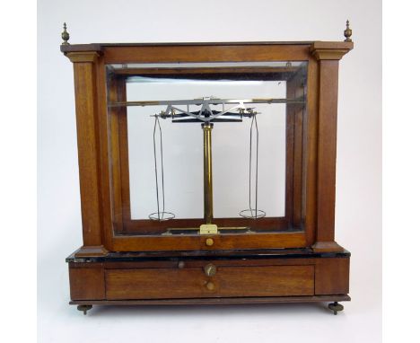 Early 20th Century American Colorado Wm. Ainsworth & Sons Mahogany, Brass and Glass Encased Balance Scale with Weights. Signe