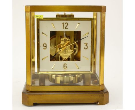 Jaeger LeCoultre Atmos Mantle Clock. Brass and glass paneled case, inscribed markers mark on movement and Arabic quarter nume