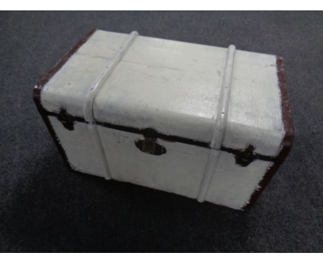 An early 20th century painted wooden bound trunk  
